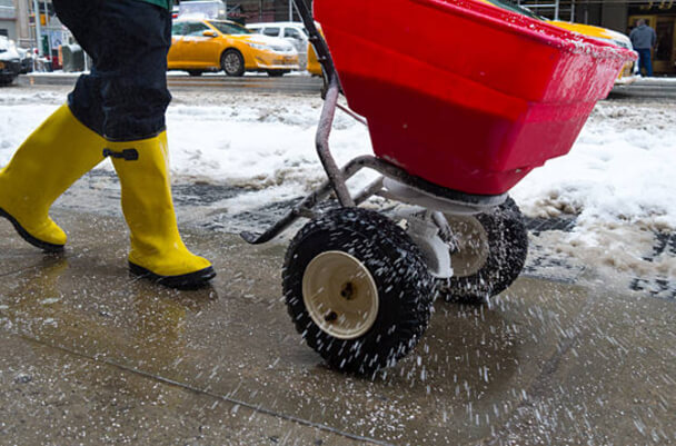 Red rock salt spreader