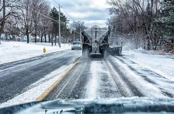 Commercial snow plow with rock salt spreader